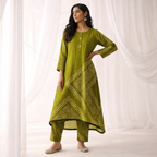 Olive Green Digital Battik Print Silk Kurta with a matching trousers in the same fabric to create a coordinated look.