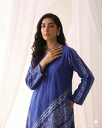 Indigo Digital Battik Print Silk Kurta with matching trousers in the same fabric to create a coordinated look.